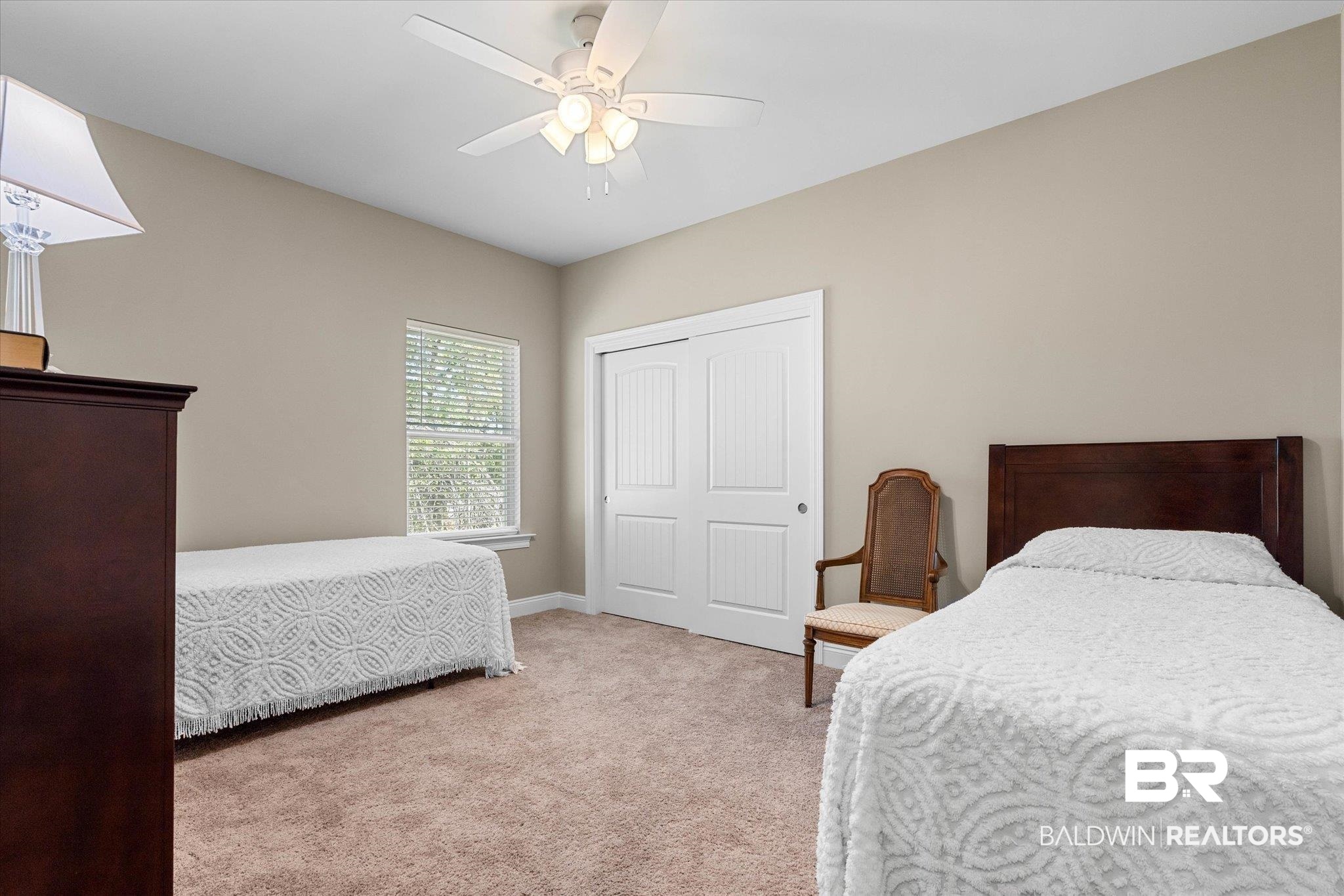 1101 Pinemont Drive Mobile, AL 36609 - Photo 14 of 18 Carpeted bedroom featuring a closet, a ceiling fan, and baseboards