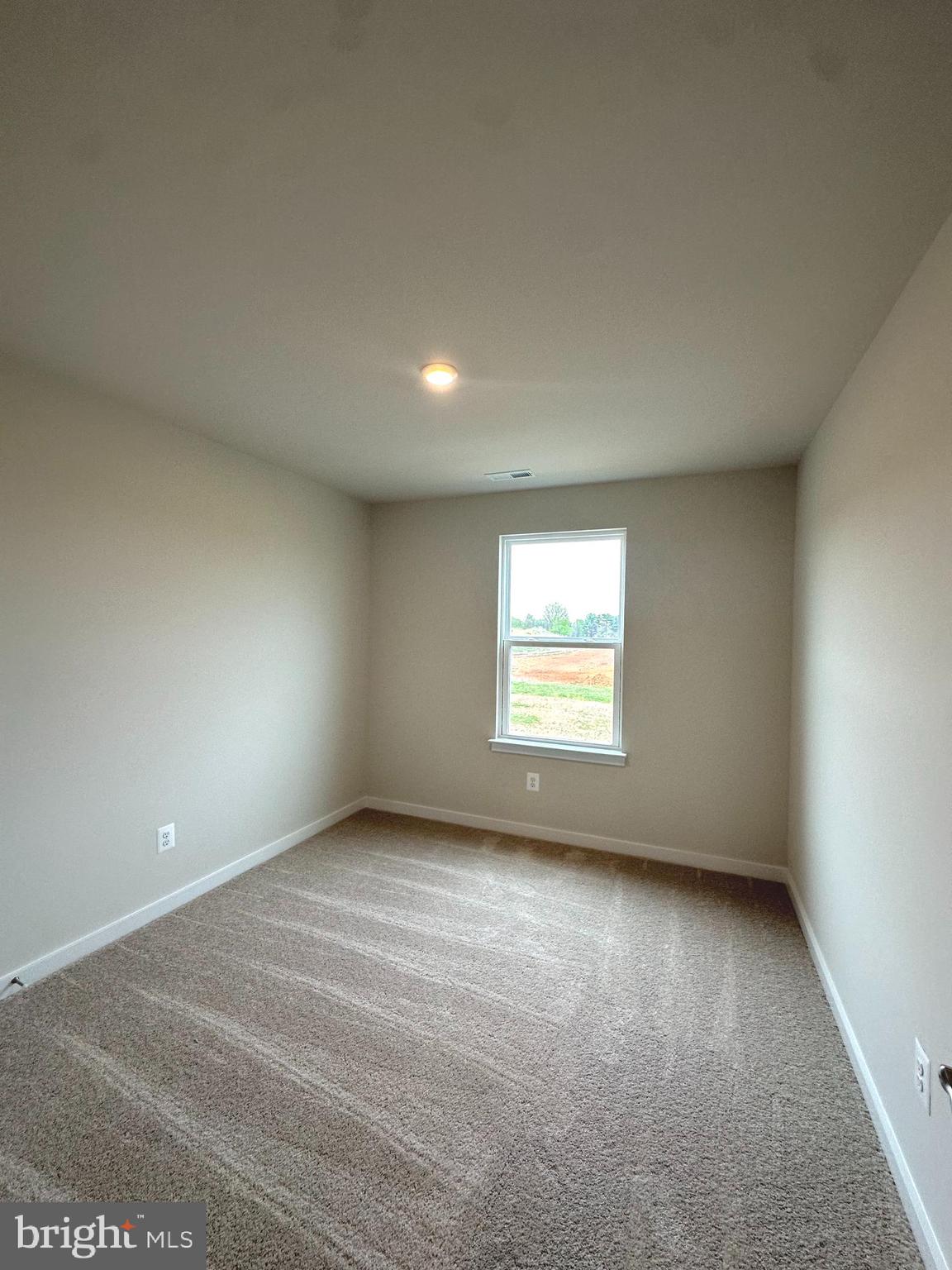 369 Huntwell W Avenue Ranson, WV 25438 - Photo 28 of 41 an empty room with a window
