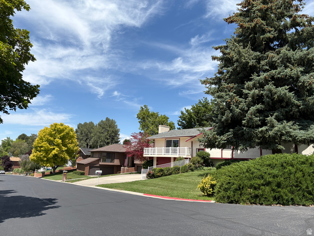 595 Meadowlark Road Orem, UT 84097 - Photo 85 of 87 Split-level residence featuring a white balcony with red trim