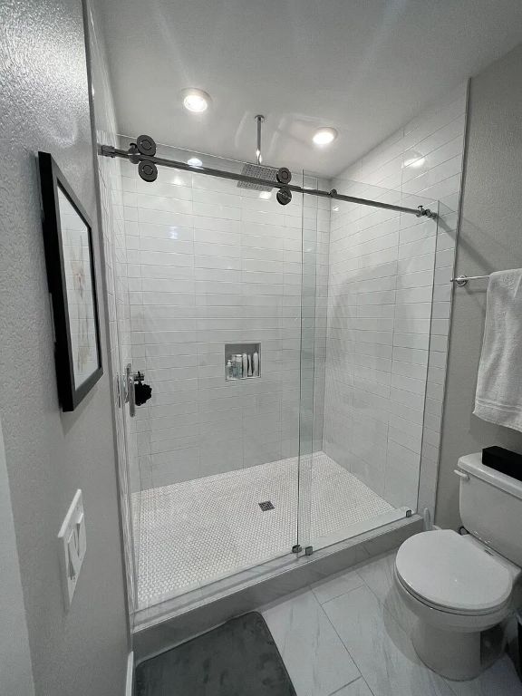 5711 Tura Lane, Unit B Austin, TX 78721 - Photo 4 of 9 Walk-in shower