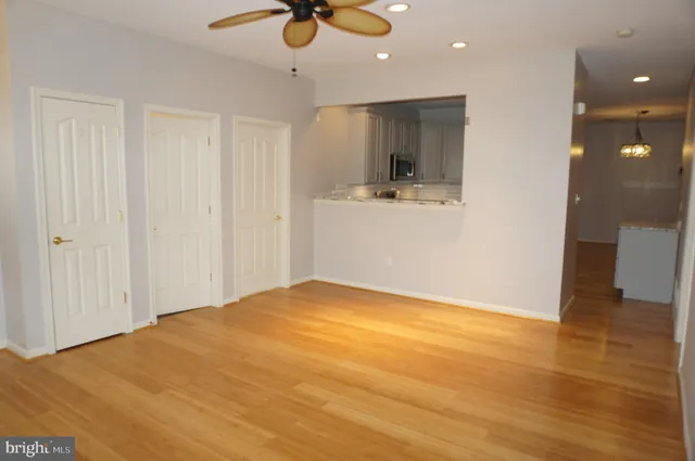 a view of a livingroom with a furniture and wooden floor