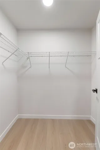 a view of a room with racks on the wall