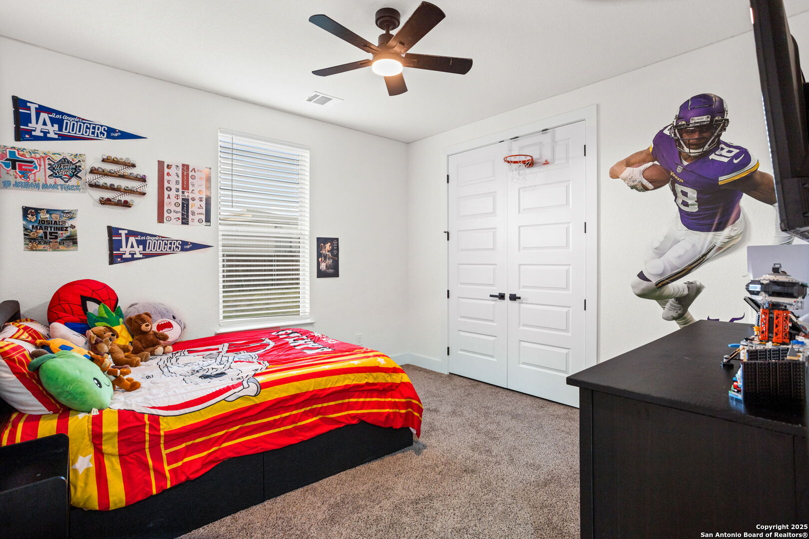 187 Stone Loop Castroville, TX 78009 - Photo 24 of 30 a bedroom that has a bed and a bed