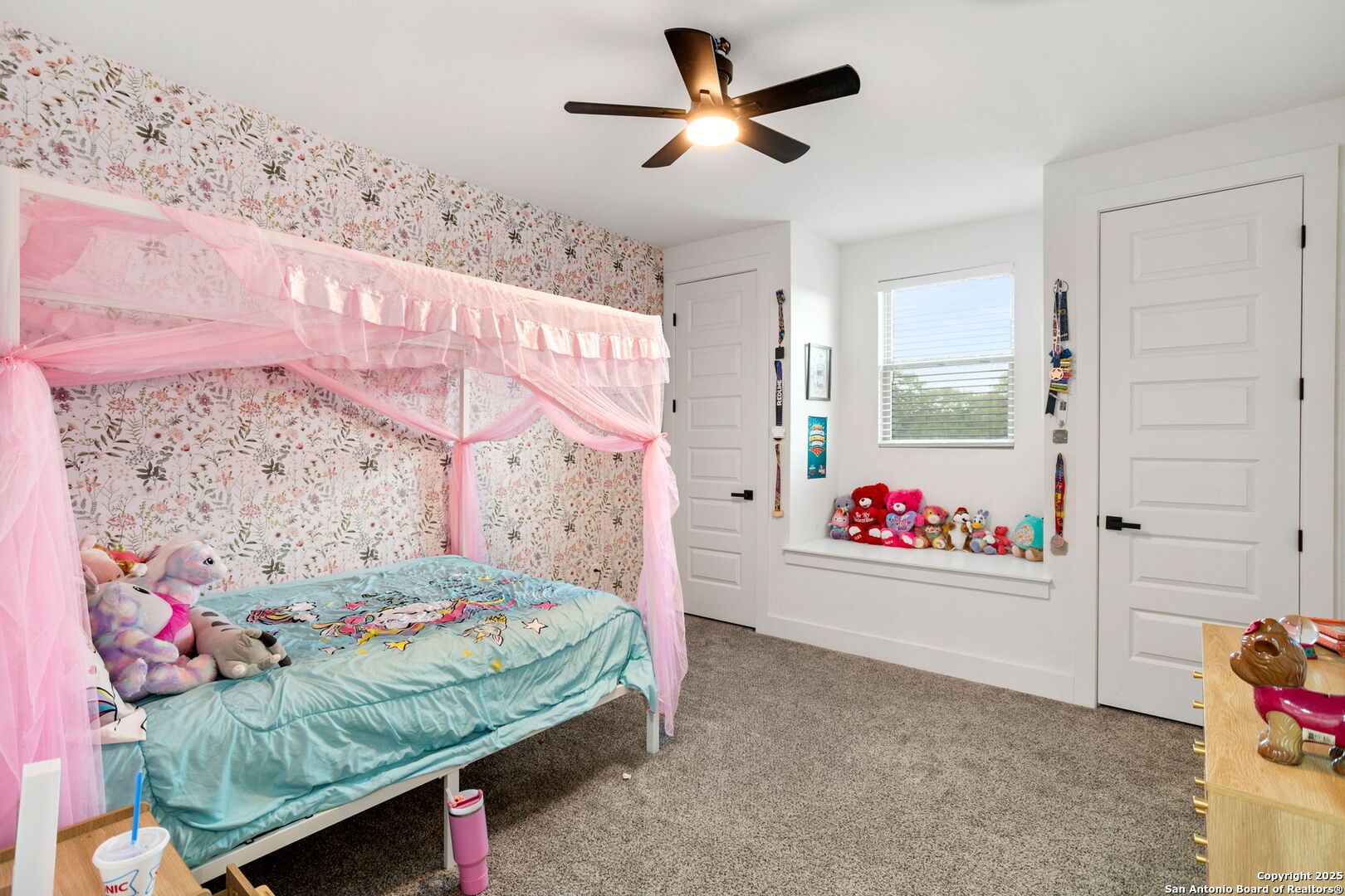 187 Stone Loop Castroville, TX 78009 - Photo 26 of 30 a bedroom with a bed and a dresser