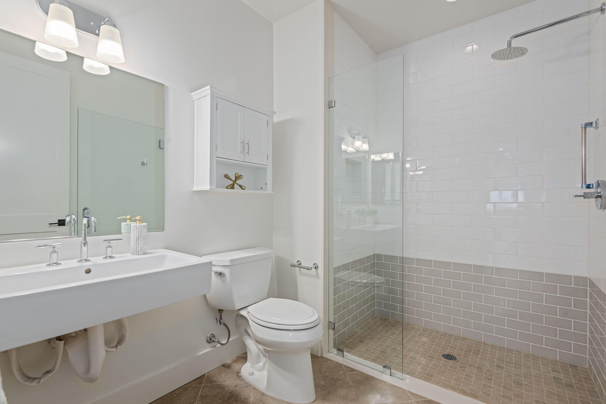 3728 State Street, Unit 136 Santa Barbara, CA 93105 - Photo 15 of 21 a bathroom with a shower sink vanity mirror and toilet