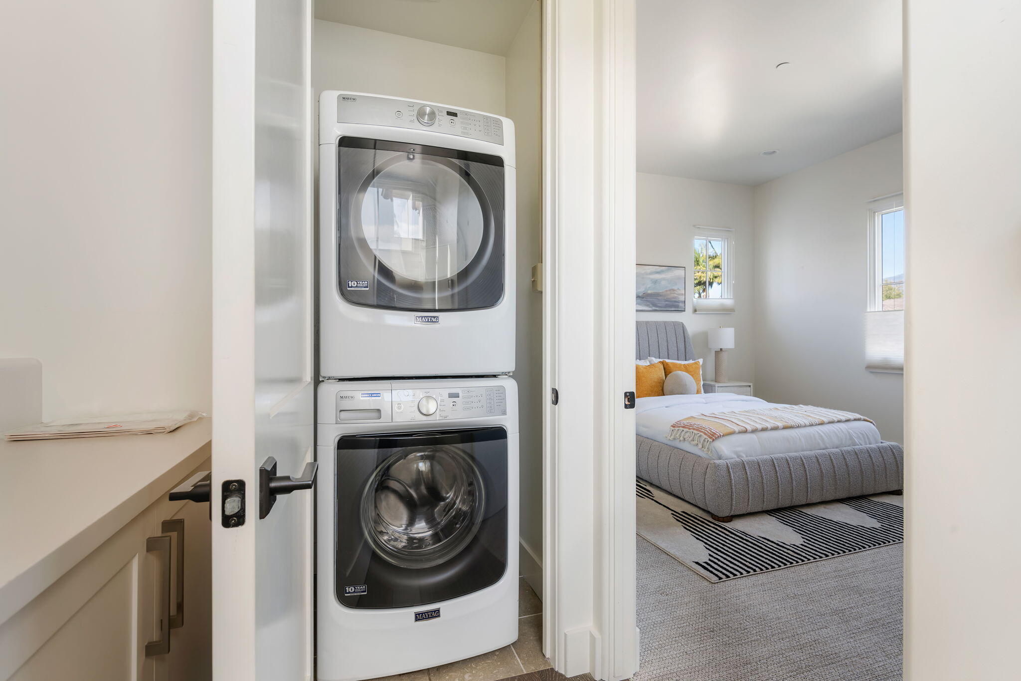 3728 State Street, Unit 136 Santa Barbara, CA 93105 - Photo 16 of 21 a bedroom with a bed and utility