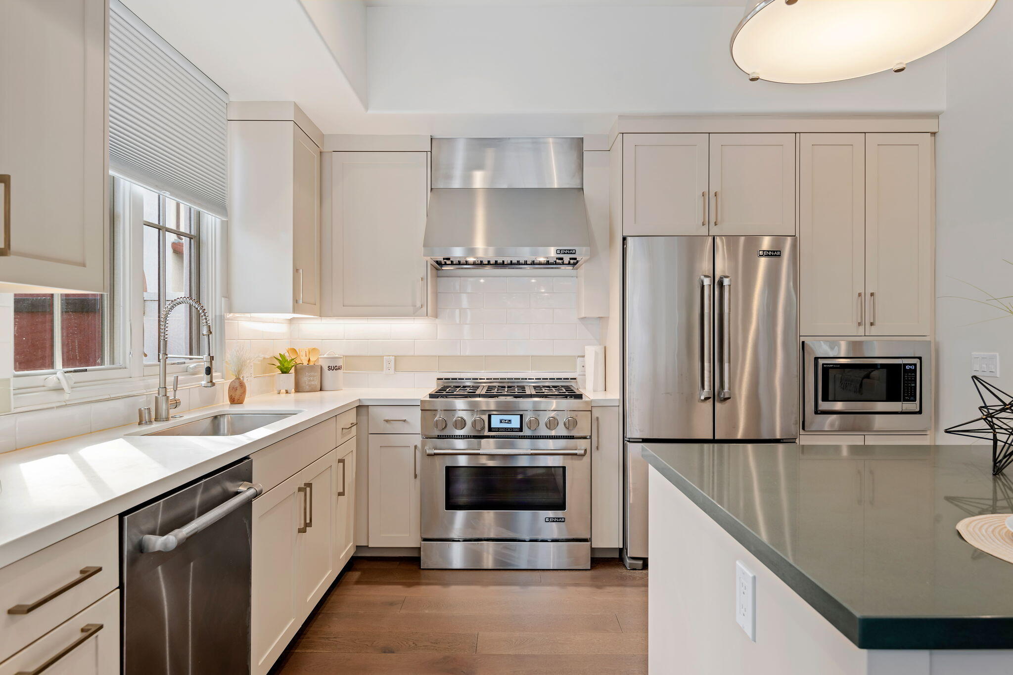 3728 State Street, Unit 136 Santa Barbara, CA 93105 - Photo 4 of 21 a kitchen with stainless steel appliances a refrigerator sink and stove