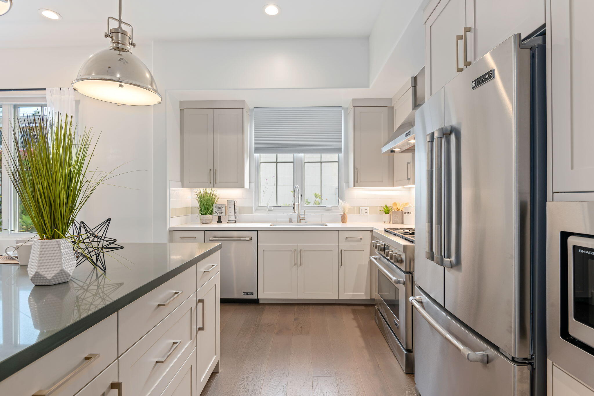 3728 State Street, Unit 136 Santa Barbara, CA 93105 - Photo 5 of 21 a kitchen with a refrigerator and a sink