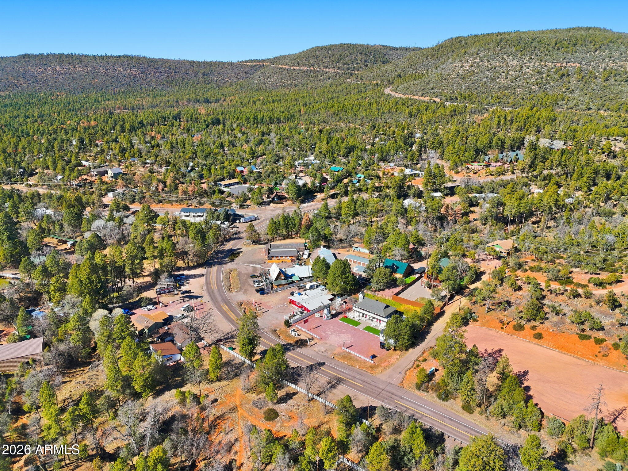 8247 Ralls Drive Pine, AZ 85544 - Photo 37 of 50 a view of a city with mountains in the background