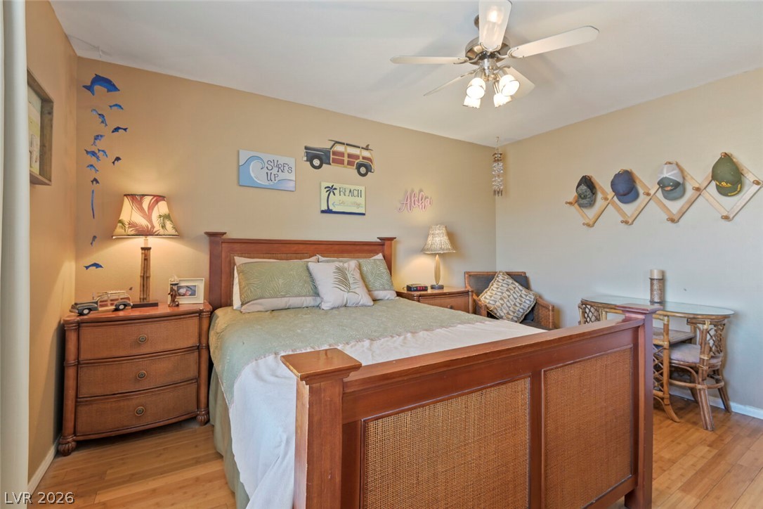 2356 Tilden Way Henderson, NV 89074 - Photo 21 of 30 Hardwood floors and a ceiling fan create a comfortable and welcoming retreat.