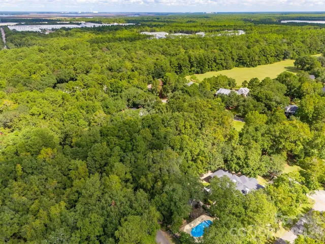 a view of a lake with a building in the background