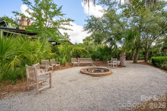a table and chairs in a garden