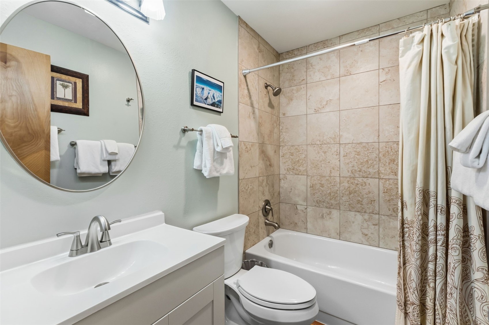 6734 Ryan Gulch Road, Unit 6734 Silverthorne, CO 80498 - Photo 19 of 33 a bathroom with a sink toilet and shower