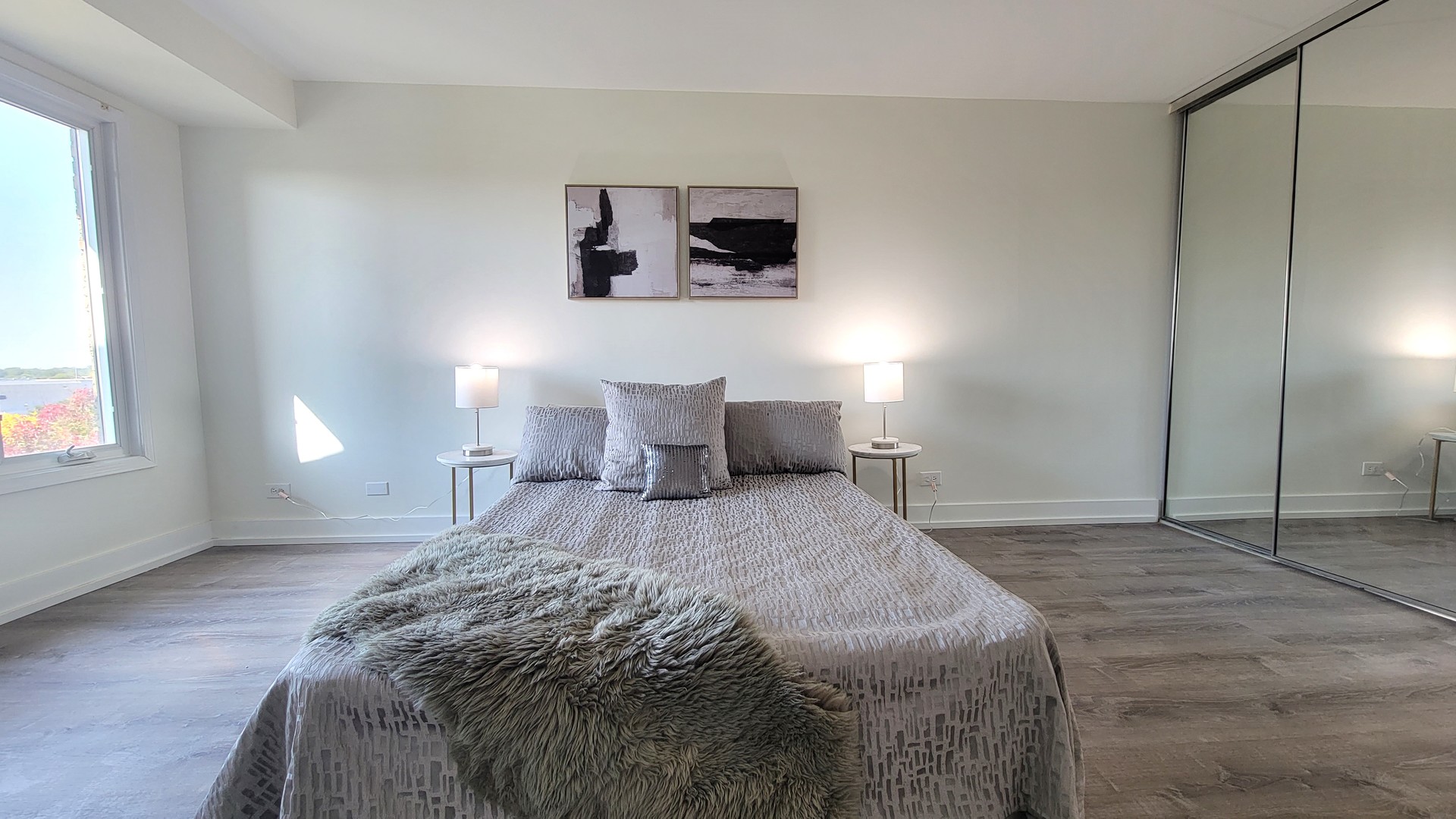 1280 Rudolph Drive, Unit 5E Northbrook, IL 60062 - Photo 10 of 33 a bedroom with a bed and window