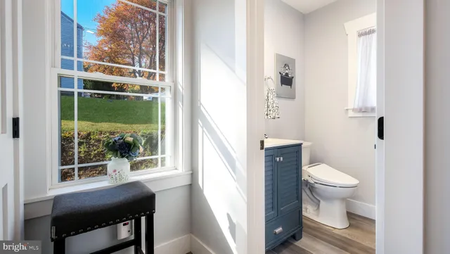 a bathroom with a toilet and a sink