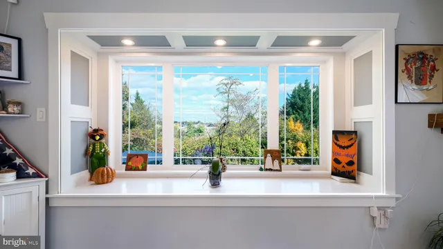 a view of counter top and dining table
