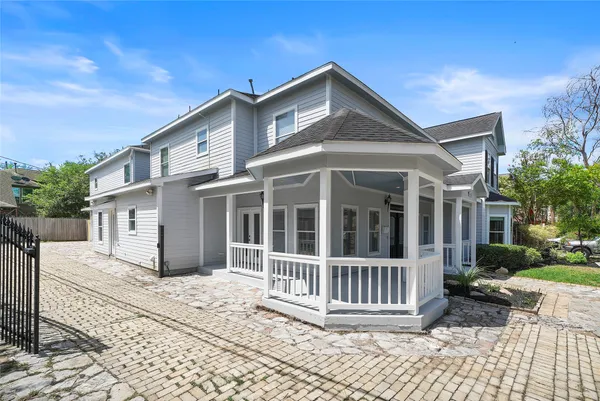 a front view of a house with a porch