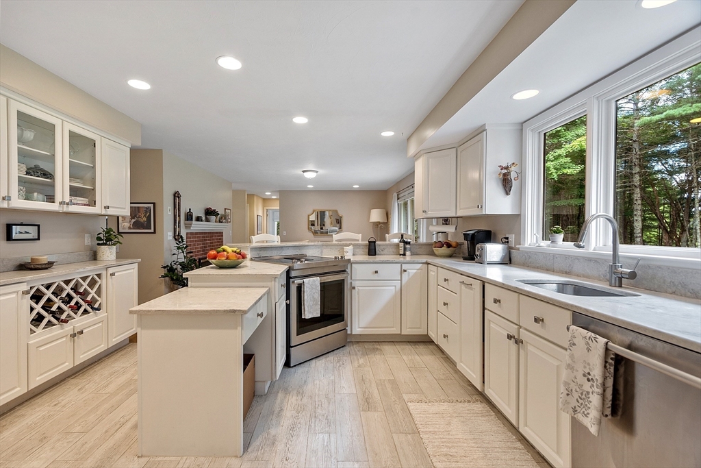 72 Finn Road Harvard, MA 01451 - Photo 11 of 40 a kitchen with sink a stove and cabinets