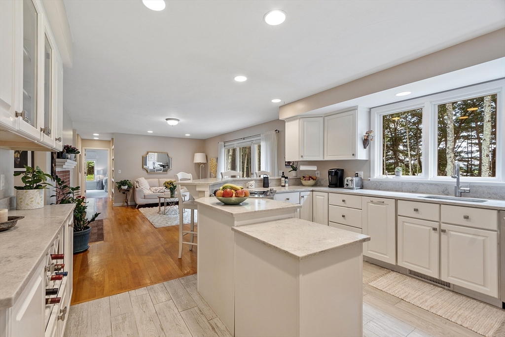72 Finn Road Harvard, MA 01451 - Photo 14 of 40 a kitchen with lots of counter top space and living room
