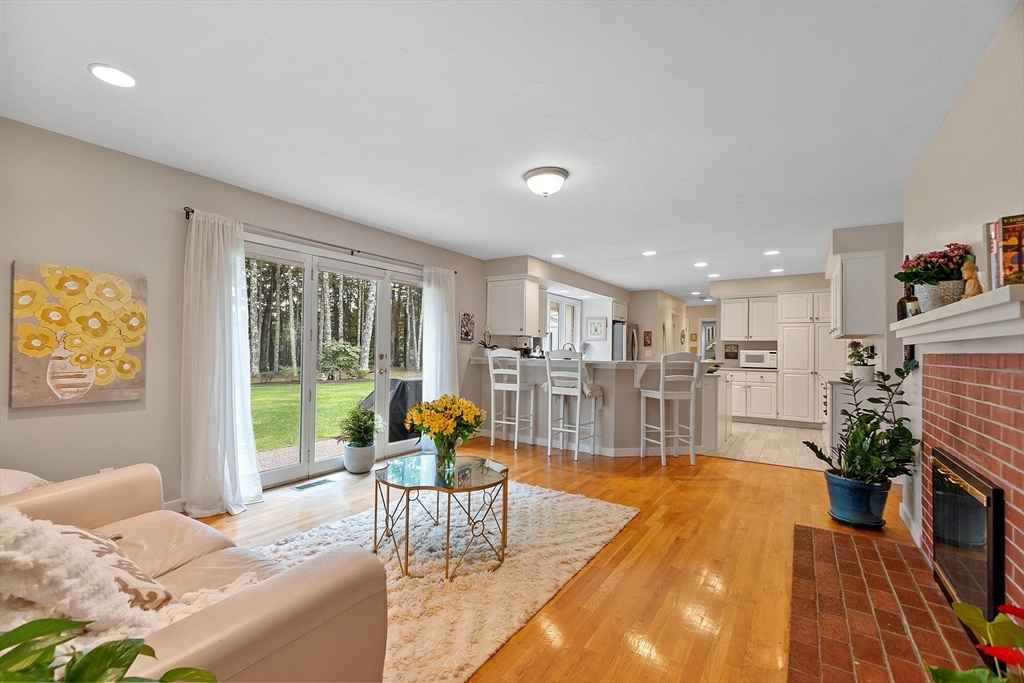 72 Finn Road Harvard, MA 01451 - Photo 16 of 40 a living room with furniture fireplace and a table