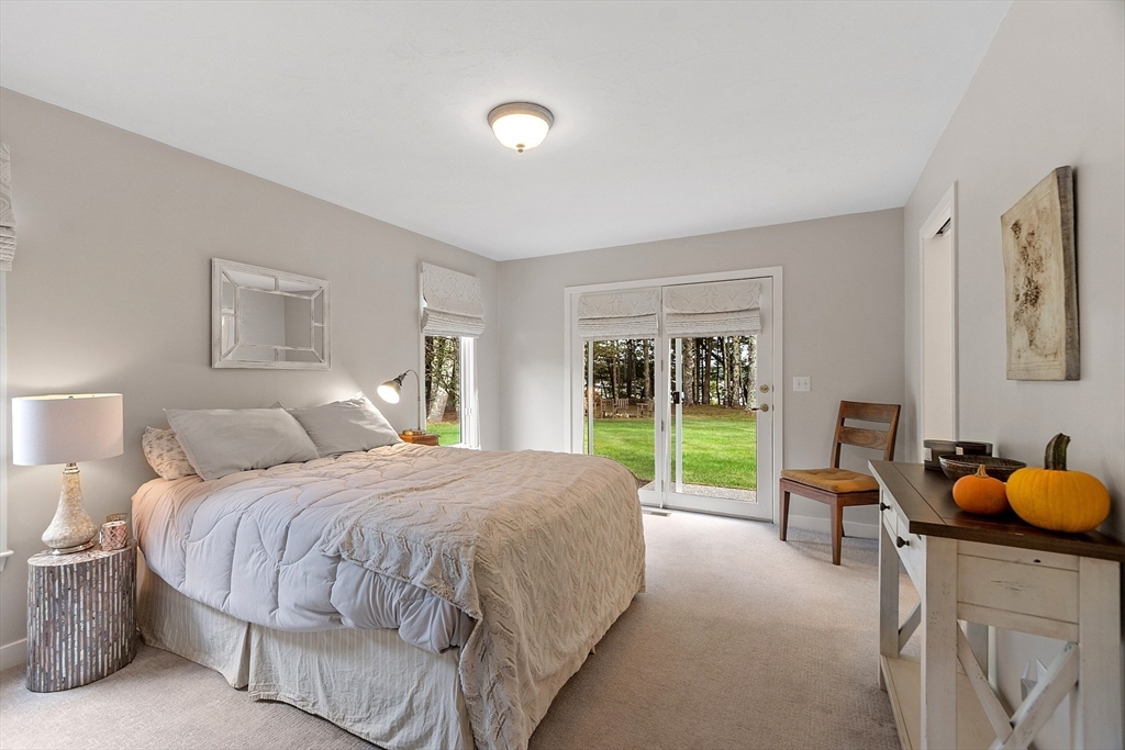 72 Finn Road Harvard, MA 01451 - Photo 18 of 40 a bedroom with a bed and a window