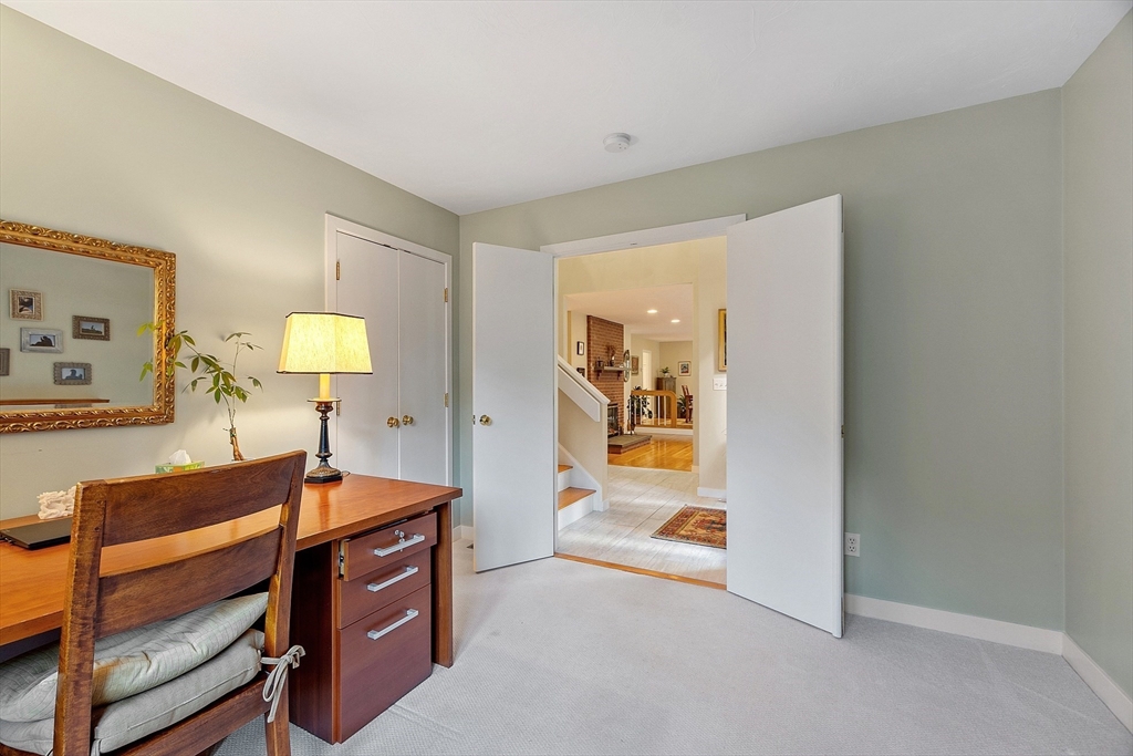 72 Finn Road Harvard, MA 01451 - Photo 20 of 40 a view of a room that has a couch and a dresser in it