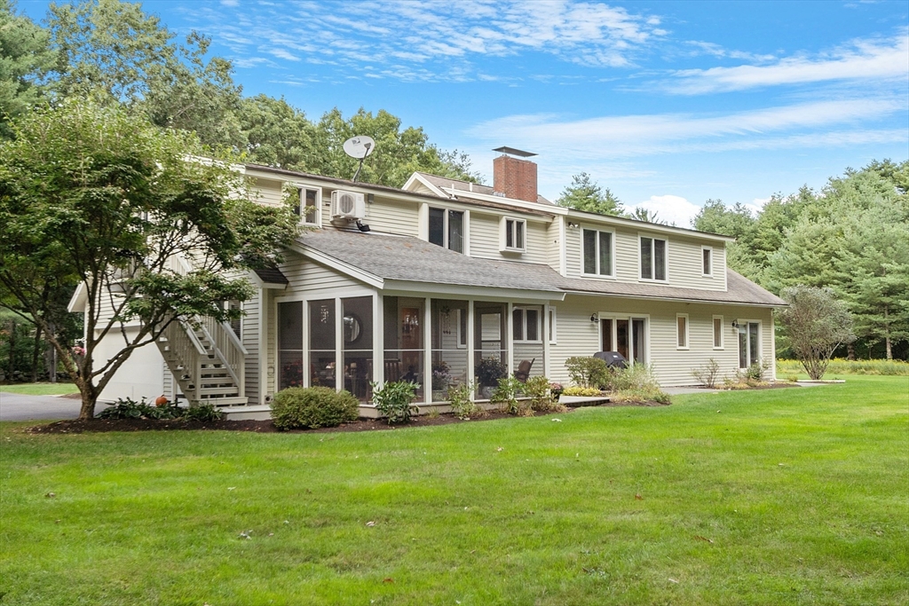 72 Finn Road Harvard, MA 01451 - Photo 27 of 40 a front view of a house with garden