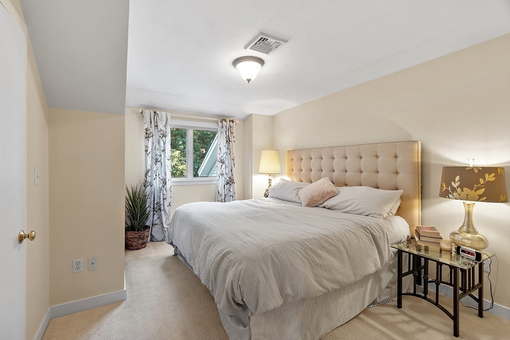 72 Finn Road Harvard, MA 01451 - Photo 32 of 40 a bedroom with a bed and window