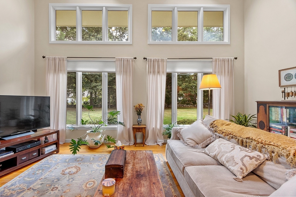 72 Finn Road Harvard, MA 01451 - Photo 4 of 40 a living room with furniture and a flat screen tv
