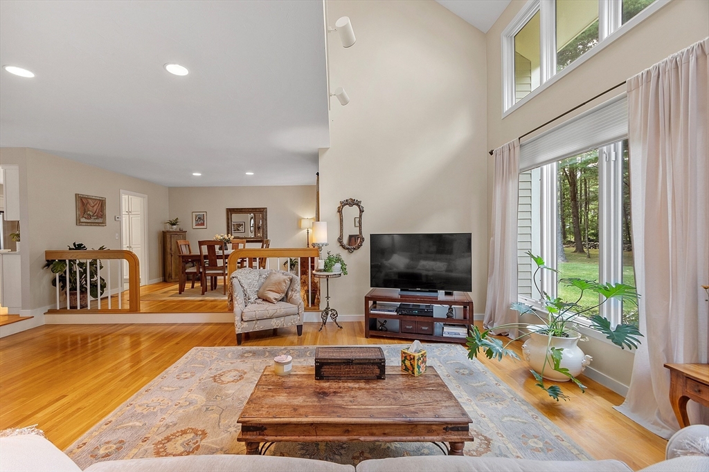 72 Finn Road Harvard, MA 01451 - Photo 7 of 40 a living room with furniture and a flat screen tv