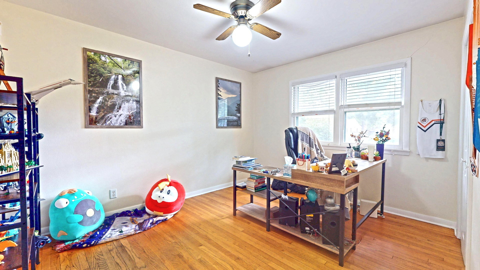 1607 West William Street Champaign, IL 61821 - Photo 11 of 14 a bedroom with furniture and a window