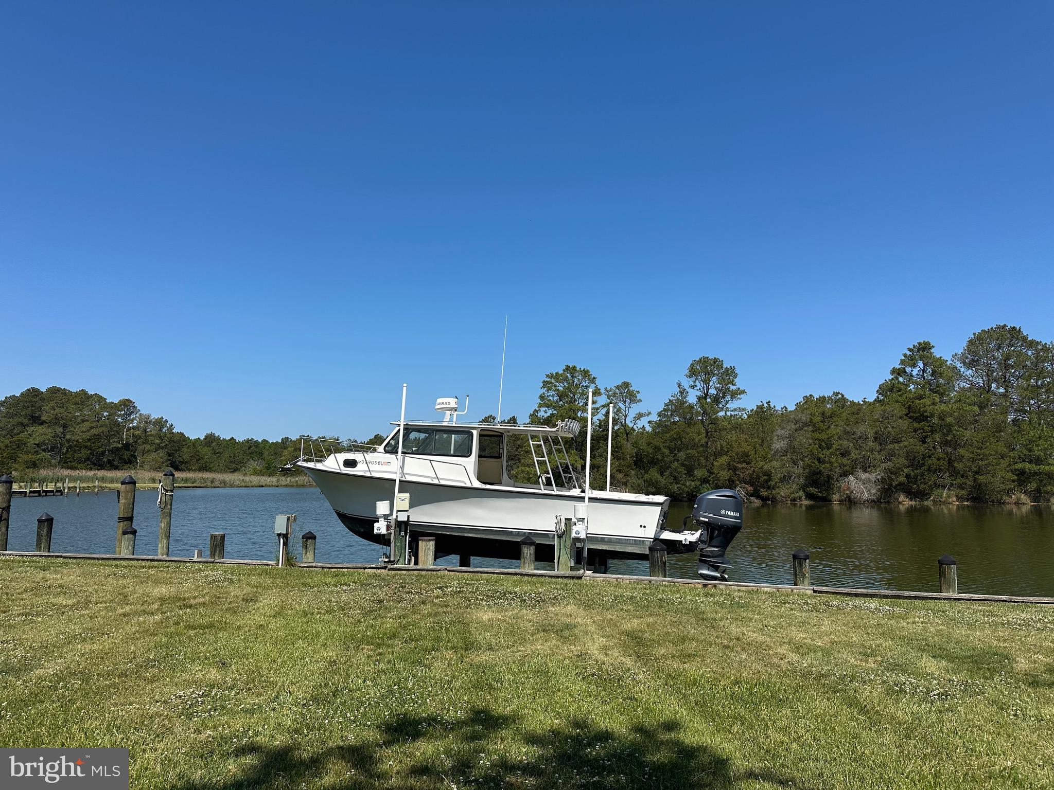 4712 Steamboat Road Woolford, MD 21677 - Photo 2 of 2 Bulkheaded shoreline with 17K boat lift