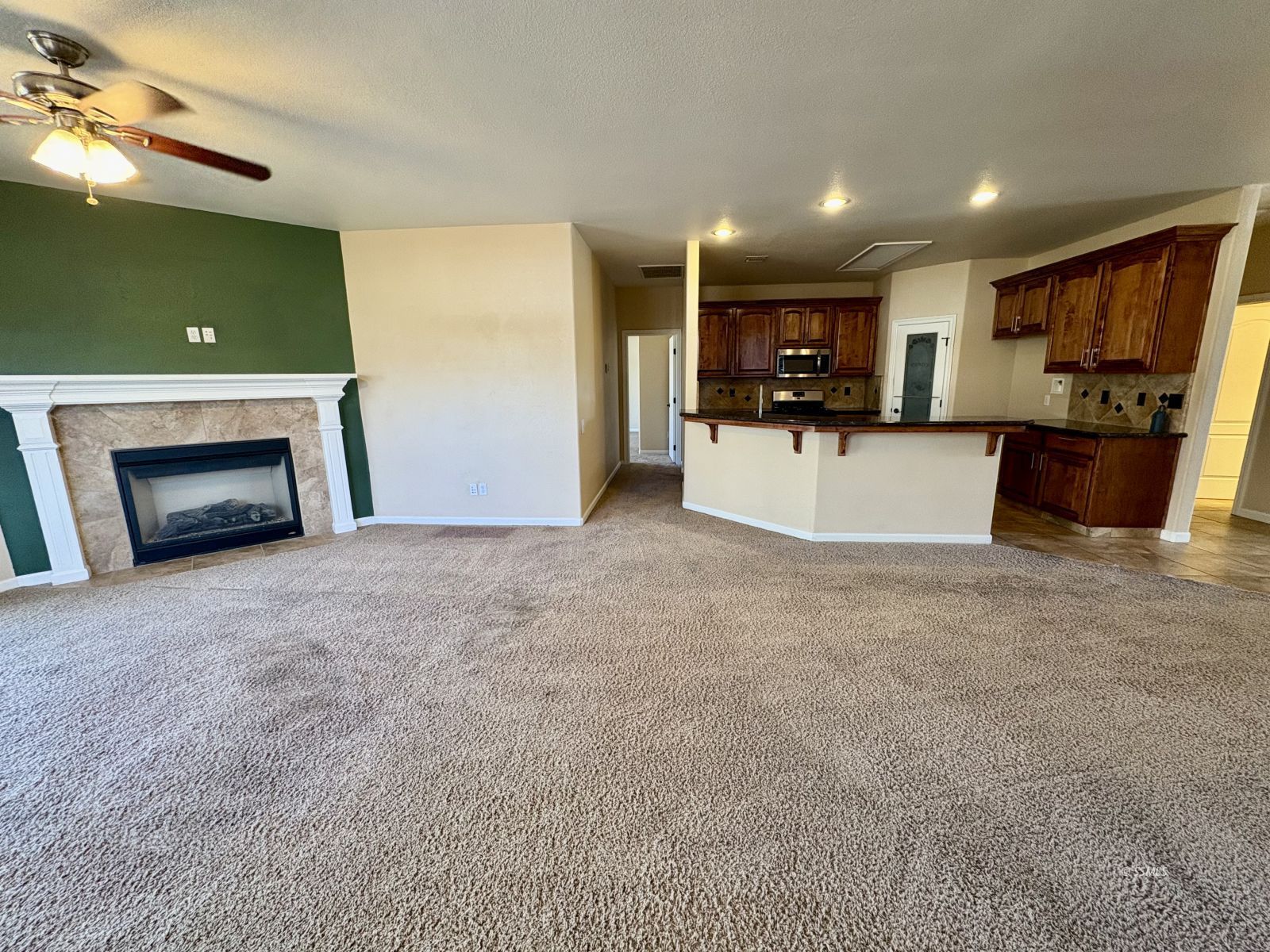 416 Olive Avenue Ridgecrest, CA 93555 - Photo 9 of 35 a view of kitchen with furniture and a refrigerator