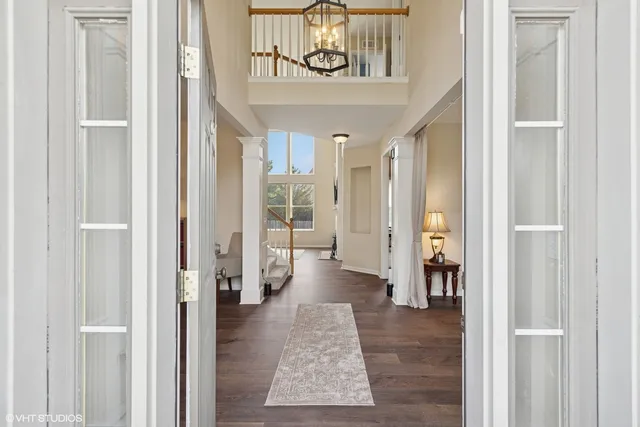 a view of an entryway with a chandelier