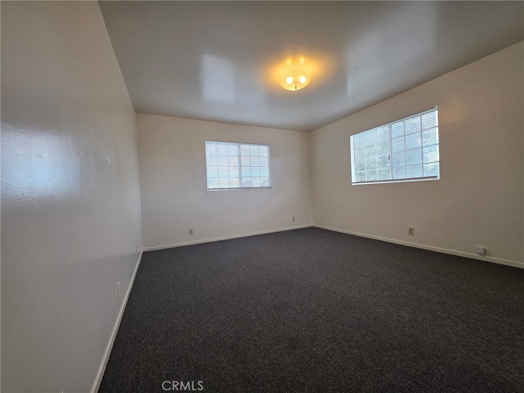 220 South Pannes Avenue, Unit 1 Compton, CA 90221 - Photo 10 of 15 an empty room with a window