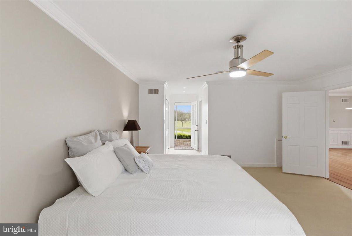 6501 Green Valley Road New Market, MD 21774 - Photo 33 of 55 Primary bedroom with Dutch door to screened porch