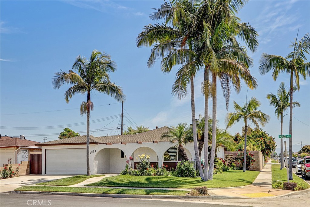 15232 Purdy Street Westminster, CA 92683 - Photo 1 of 31 a front view of a house with garden