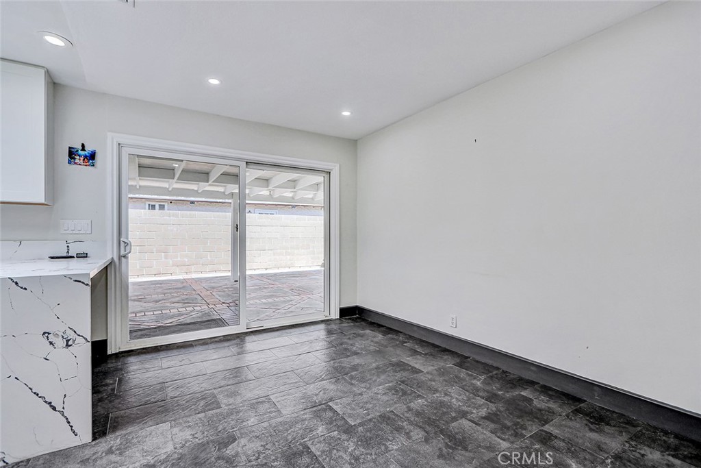 15232 Purdy Street Westminster, CA 92683 - Photo 14 of 31 a view of empty room with wooden floor and fan