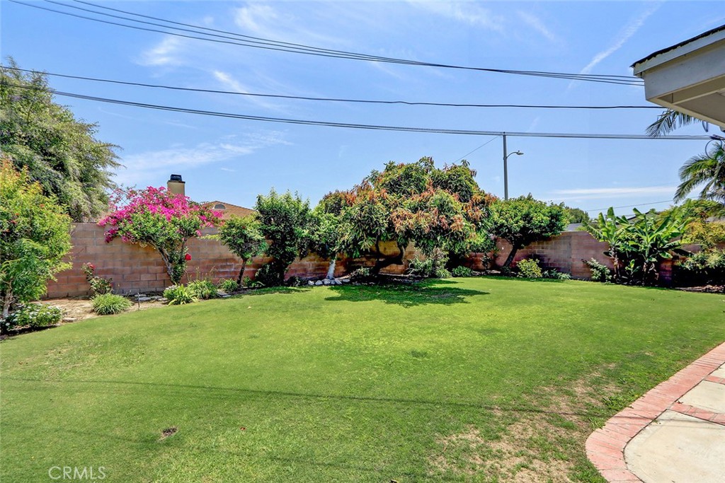 15232 Purdy Street Westminster, CA 92683 - Photo 29 of 31 a backyard of a house with lots of green space