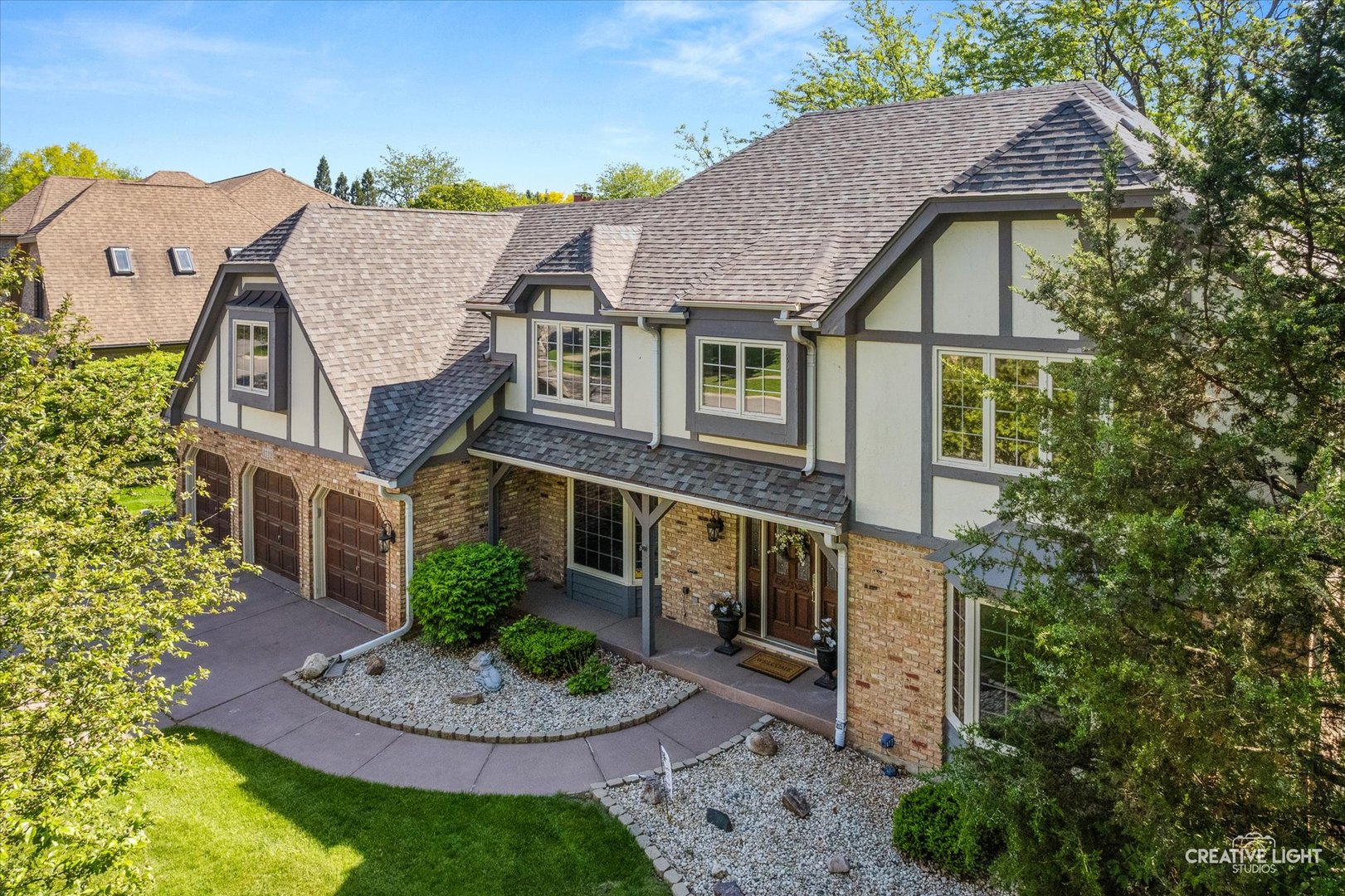 3112 Turnberry Road St. Charles, IL 60174 - Photo 2 of 43 a aerial view of a house with a yard and potted plants
