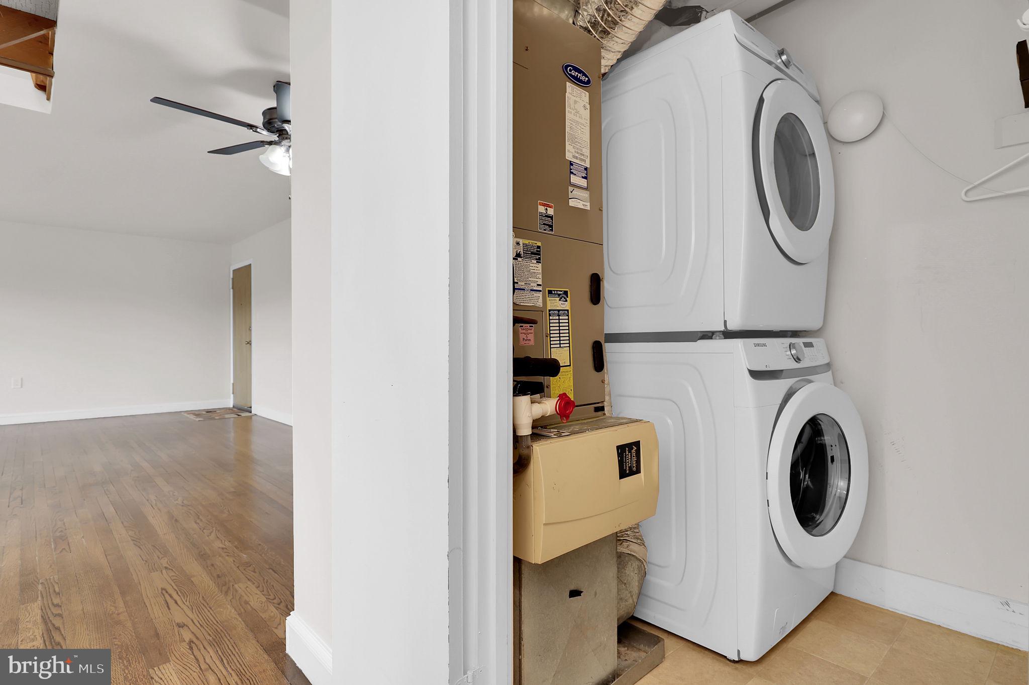 11514 Bucknell Drive, Unit 202 Silver Spring, MD 20902 - Photo 11 of 31 a utility room with dryer and washer