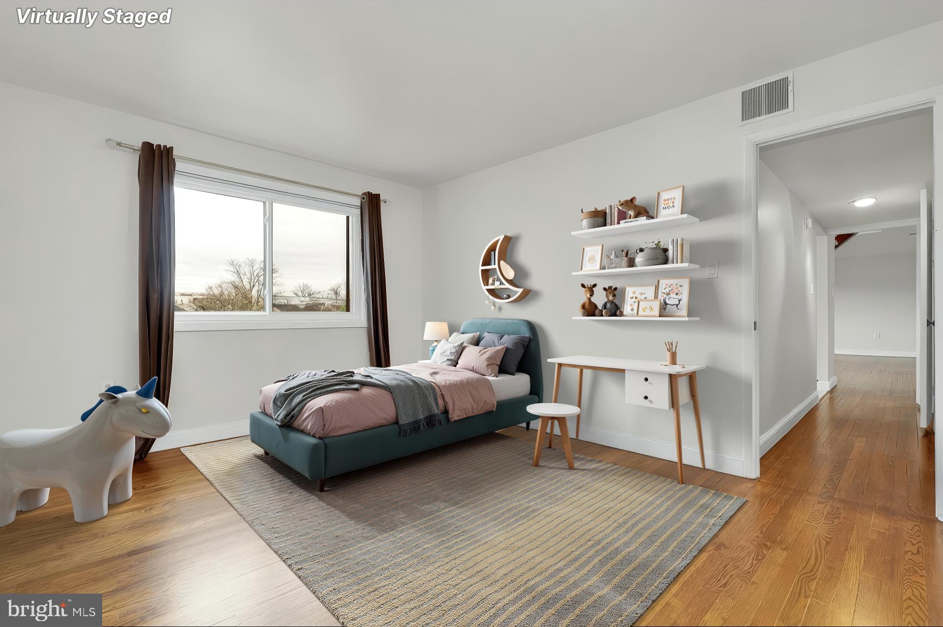 11514 Bucknell Drive, Unit 202 Silver Spring, MD 20902 - Photo 14 of 31 a living room with furniture and a large window
