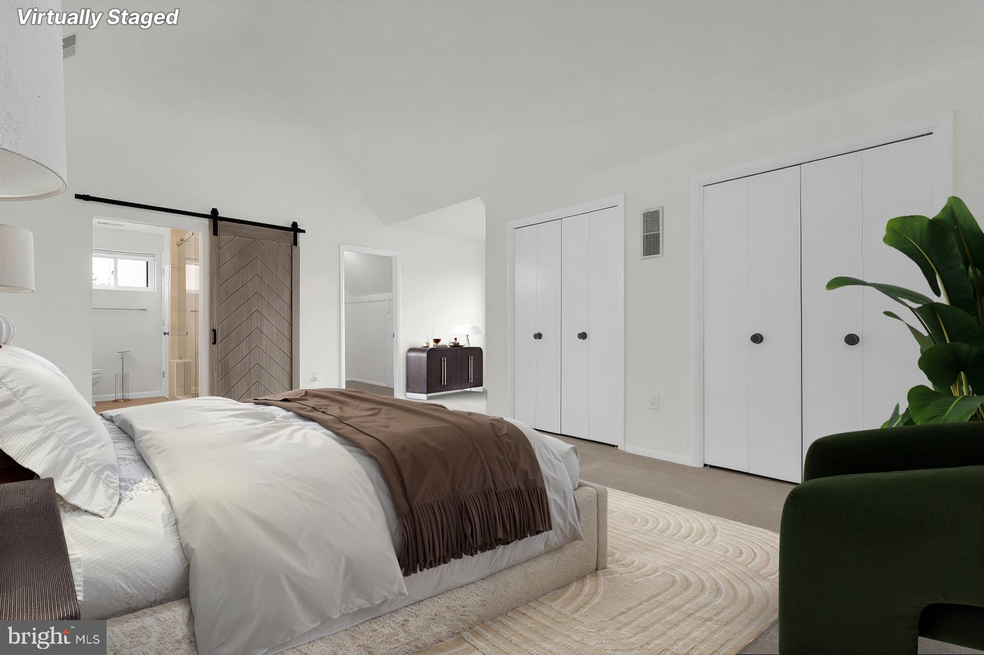 11514 Bucknell Drive, Unit 202 Silver Spring, MD 20902 - Photo 20 of 31 a spacious bedroom with a bed and a closet