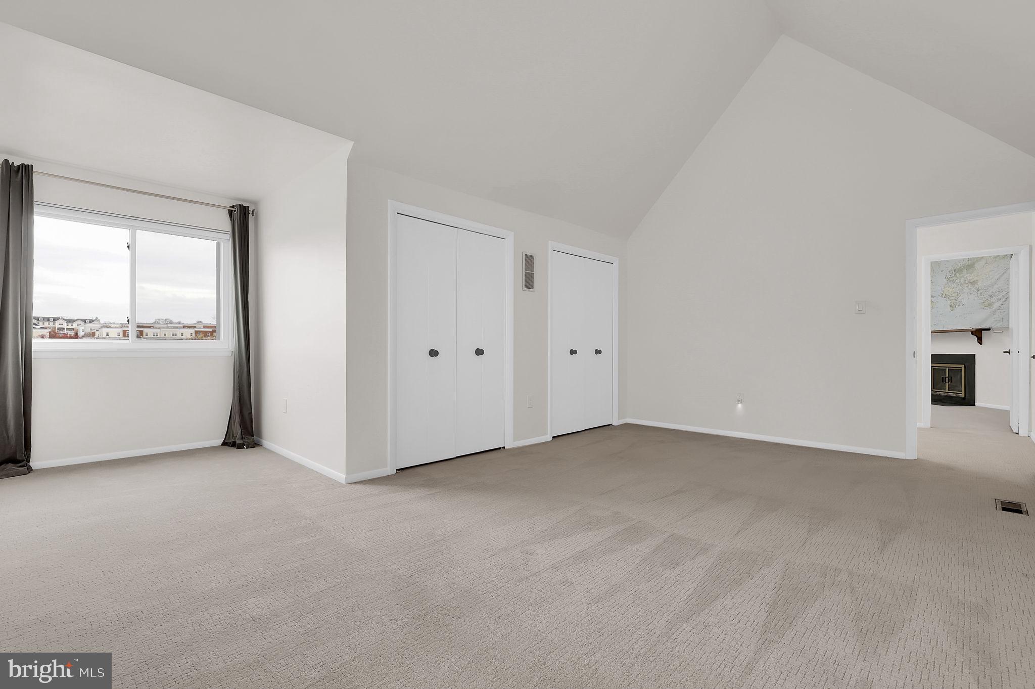 11514 Bucknell Drive, Unit 202 Silver Spring, MD 20902 - Photo 21 of 31 an empty room with windows