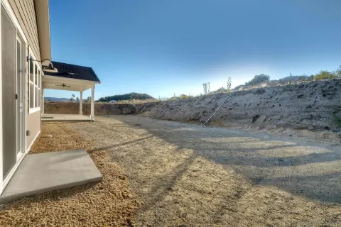 a view of a living room filled with furniture