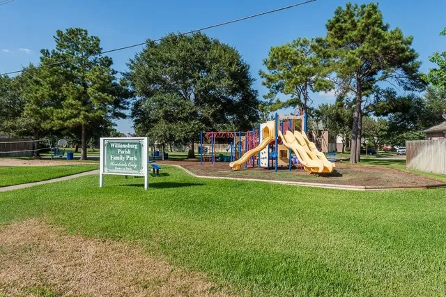 a view of a park with swings