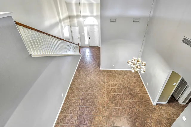 a view of a hallway with stair