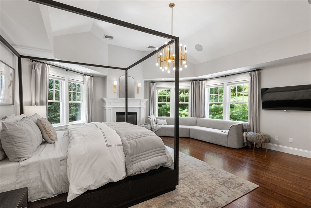 5 Beard Way Wellesley, MA 02482 - Photo 25 of 36 a bedroom with a large bed and a large window