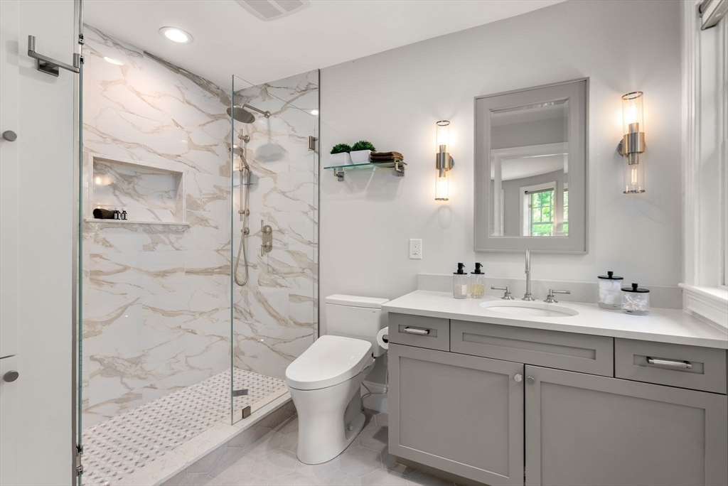 5 Beard Way Wellesley, MA 02482 - Photo 32 of 36 a bathroom with a sink toilet and shower