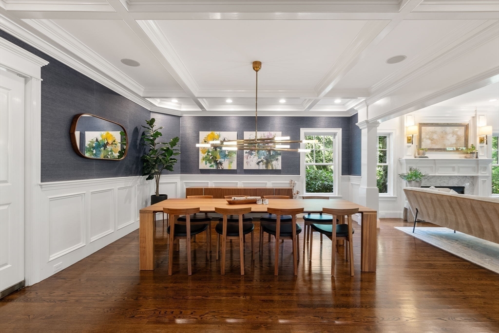5 Beard Way Wellesley, MA 02482 - Photo 7 of 36 a kitchen with lots of wooden furniture dining table and chairs